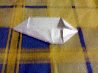 One corner folded to the middle