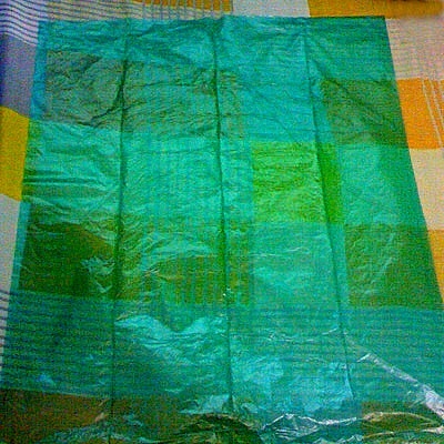 Flattened plastic bad on a table