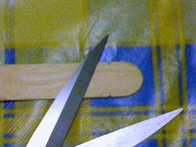 Preparing to attach the string 1