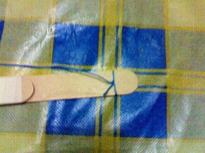 Preparing to attach the string 3